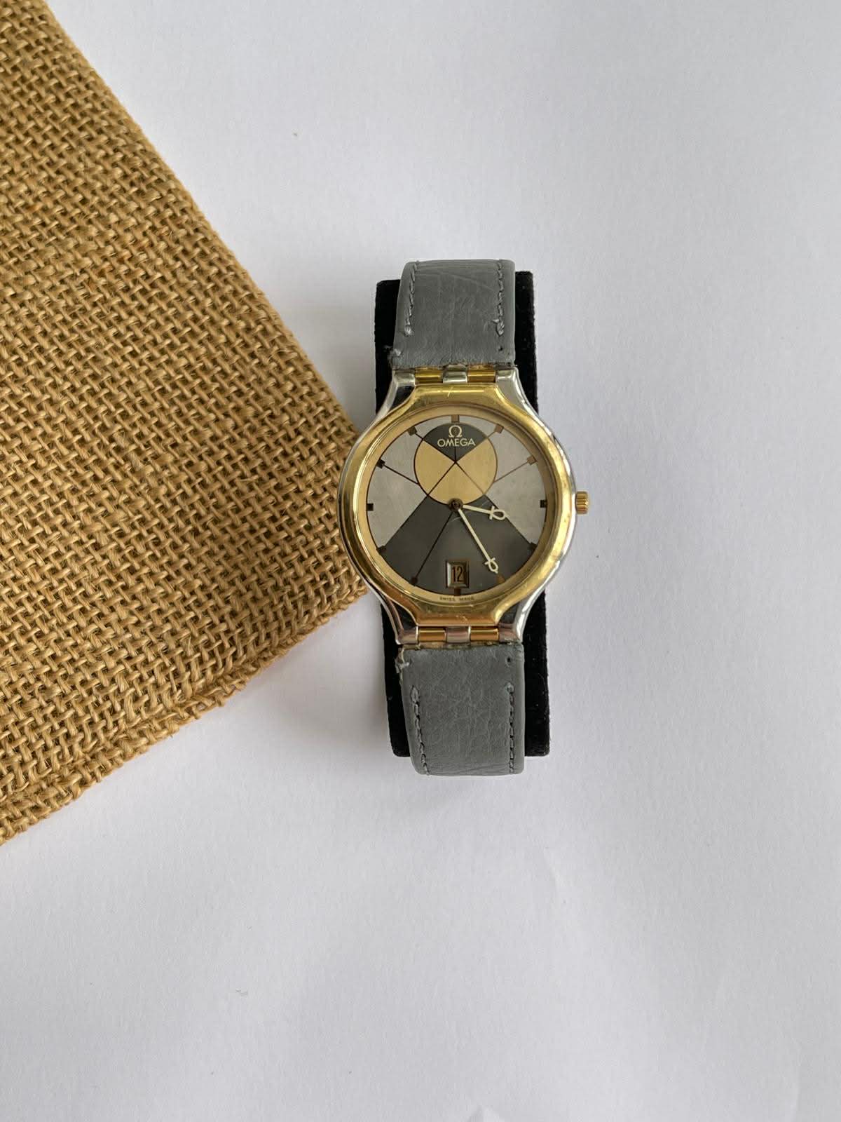 Omega De Ville Symbol - bezel aur 18K