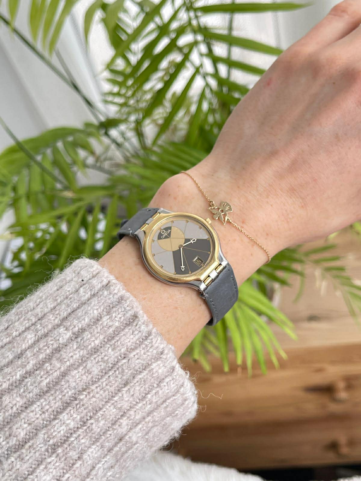 Omega De Ville Symbol - bezel aur 18K
